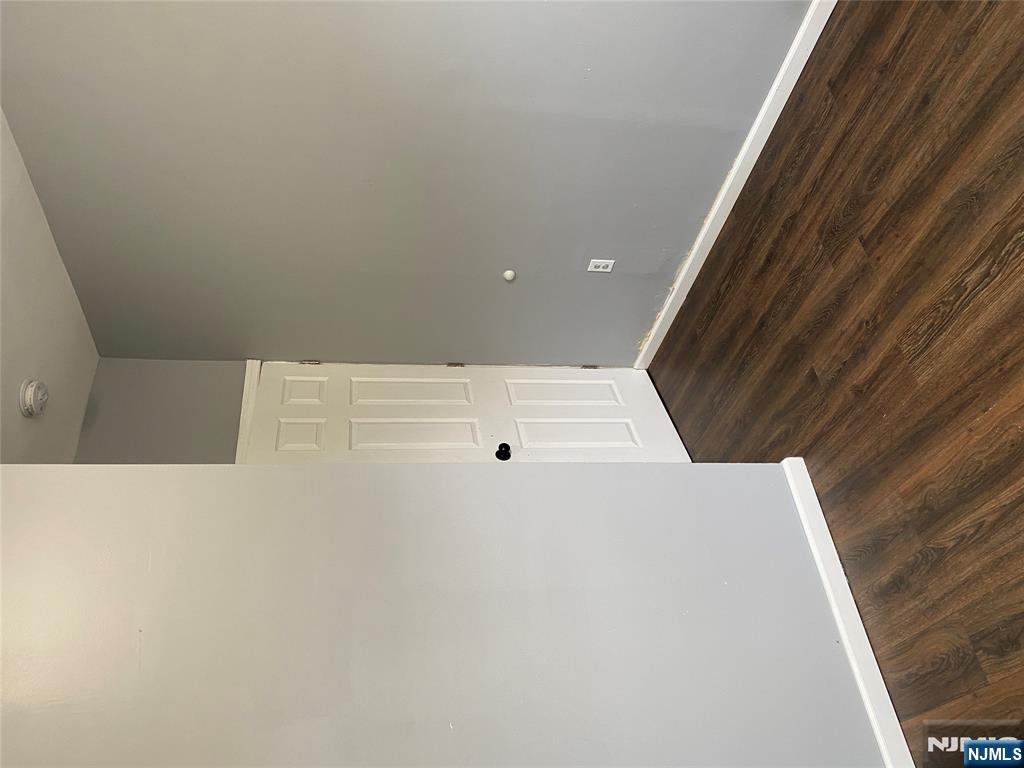 540 South 20th Street, Unit 2 Newark, NJ 07103 - Photo 9 of 13 a view of an empty room with wooden floor