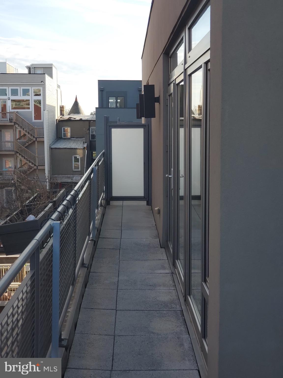 1466 Harvard Street Northwest, Unit PH3 Washington, DC 20009 - Photo 25 of 26 Balcony runs the full length of Condo