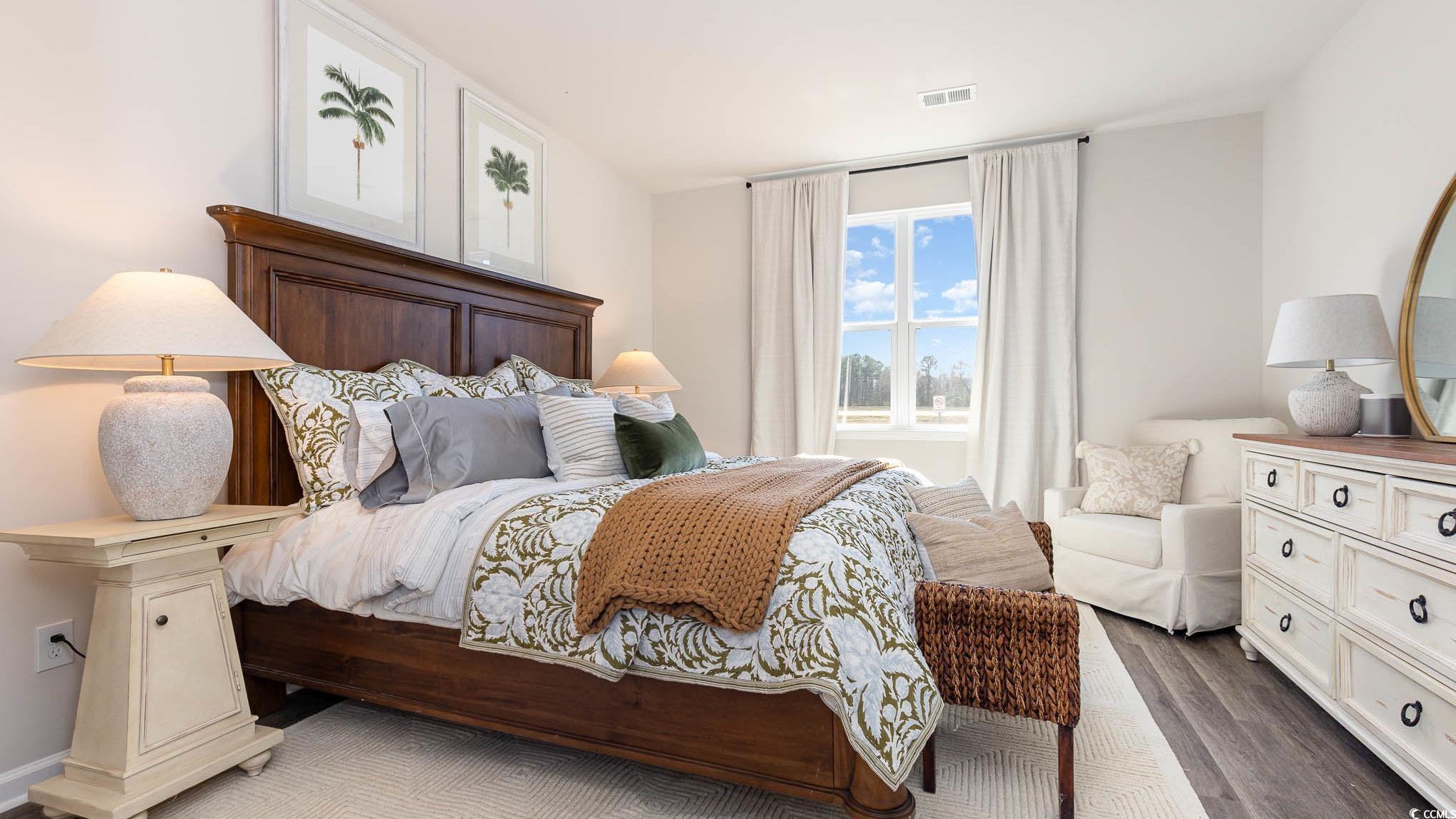 2083 Locust Ridge Drive Shallotte, NC 28470 - Photo 15 of 22 Bedroom with dark wood-type flooring