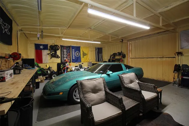 a room with furniture and a flat screen tv