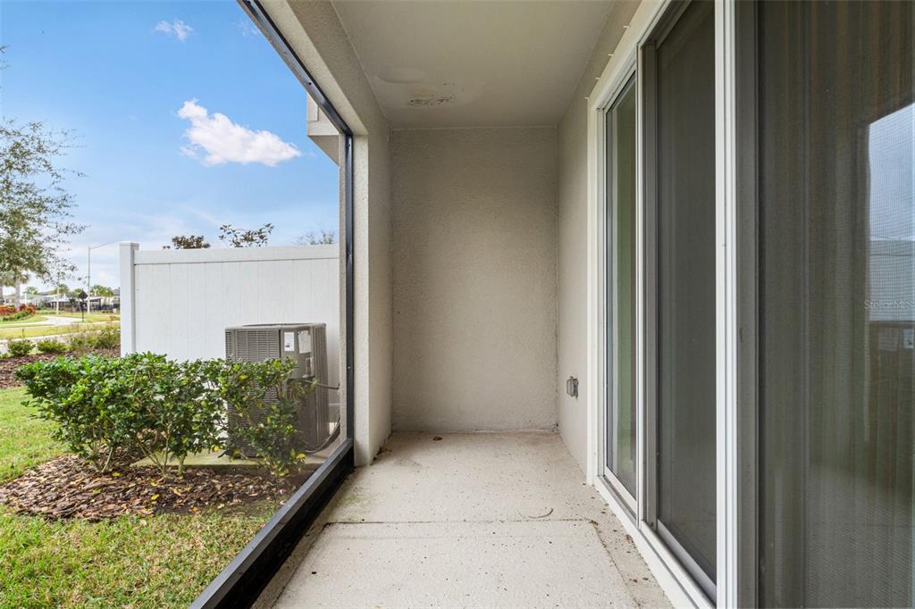 31329 Amberview Bend Wesley Chapel, FL 33545 - Photo 30 of 57 a view of balcony with wooden floor