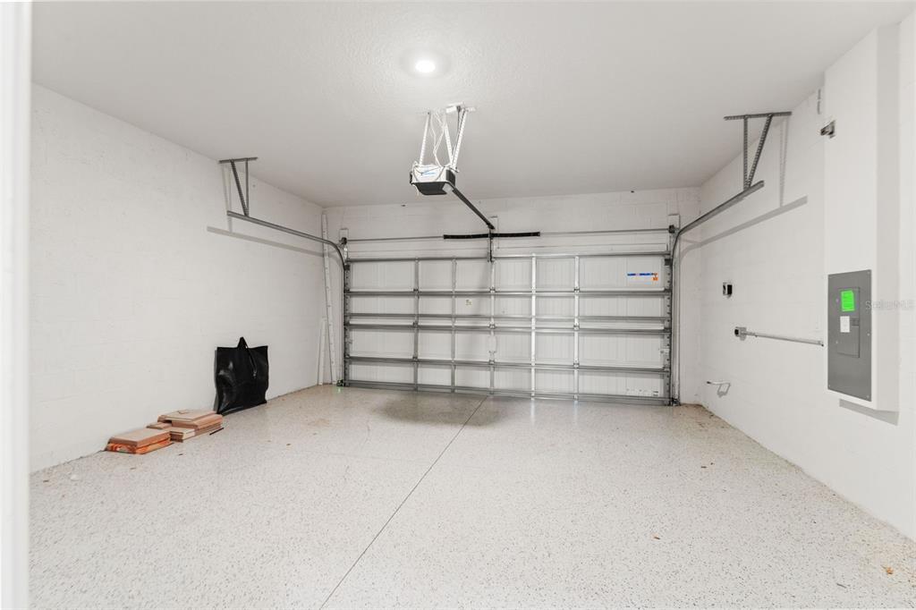 31329 Amberview Bend Wesley Chapel, FL 33545 - Photo 32 of 57 a view of a garage room