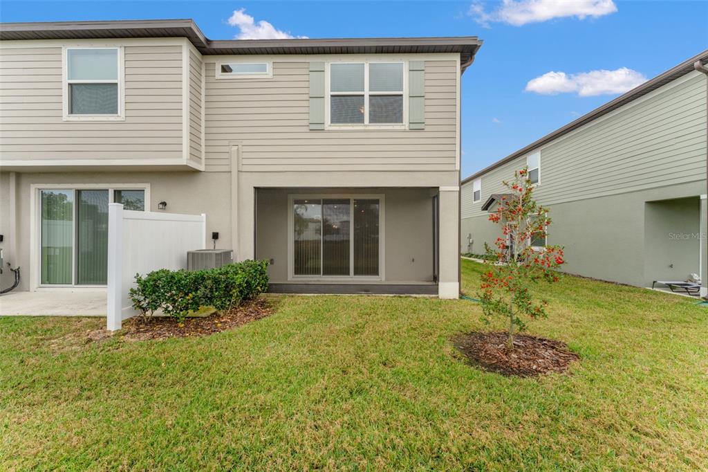 31329 Amberview Bend Wesley Chapel, FL 33545 - Photo 34 of 57 a front view of a house with garden