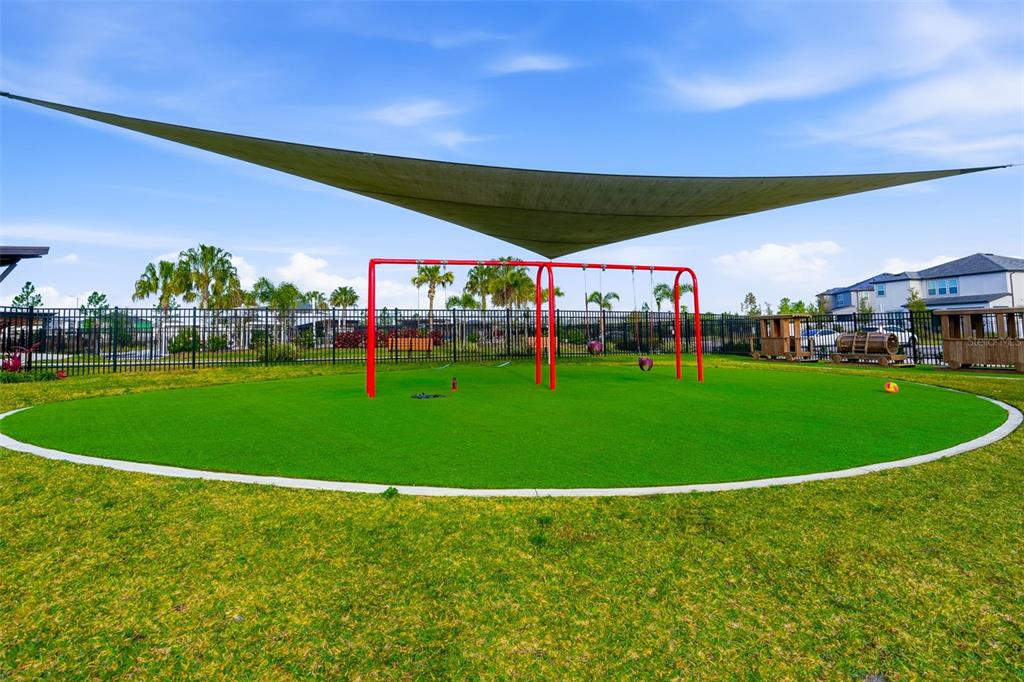 31329 Amberview Bend Wesley Chapel, FL 33545 - Photo 52 of 57 a view of a golf course with a swimming pool