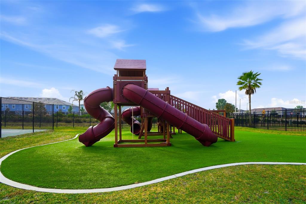 31329 Amberview Bend Wesley Chapel, FL 33545 - Photo 56 of 57 a view of a golf course with a swimming pool
