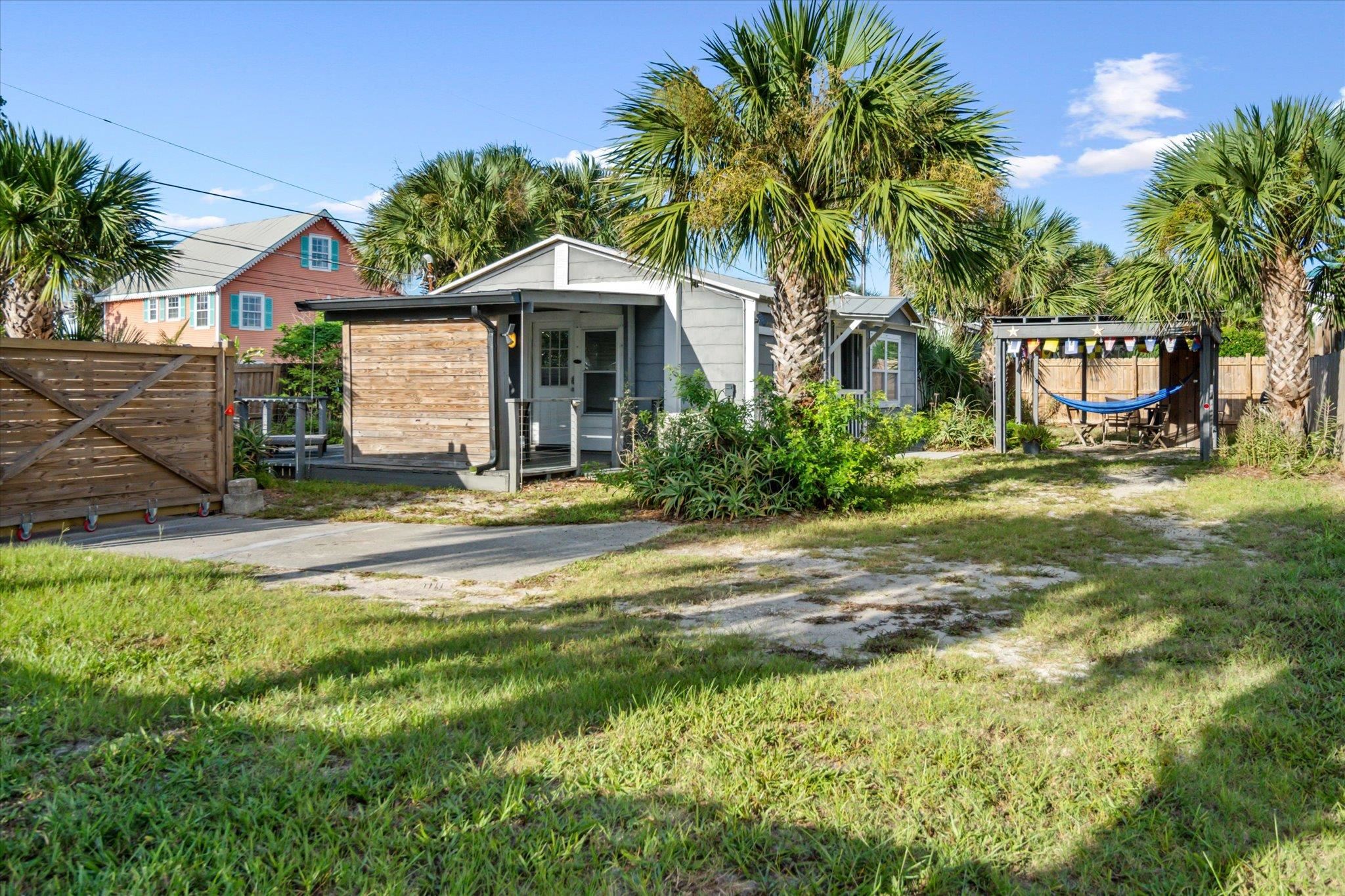 51 A Beachcomber Way St. Augustine, FL 32084 - Photo 8 of 53 a front view of a house with garden