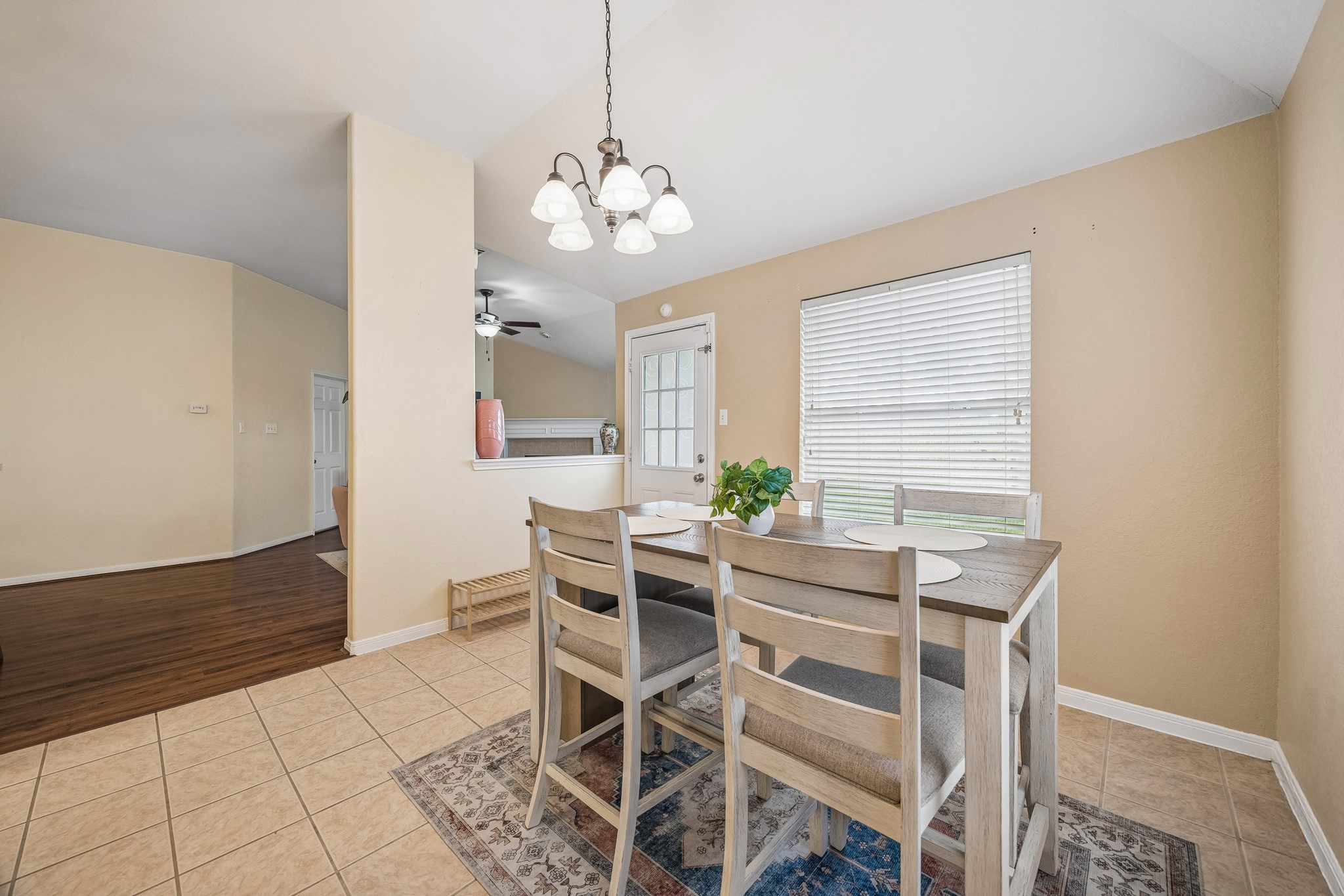 24027 Floragate Drive Spring, TX 77373 - Photo 10 of 21 a view of a dining room with furniture and chandelier