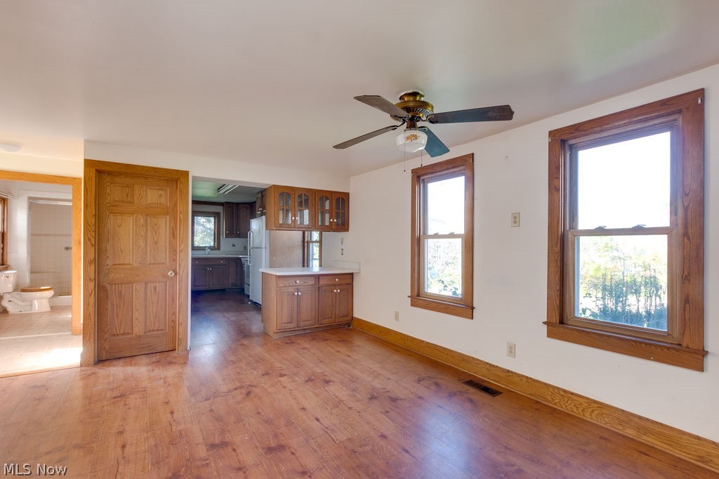 8584 Sherman Road Chesterland, OH 44026 - Photo 5 of 24 Country sized dining space - full bath on main floor off Country Dining Room with updated kitchen at far end
