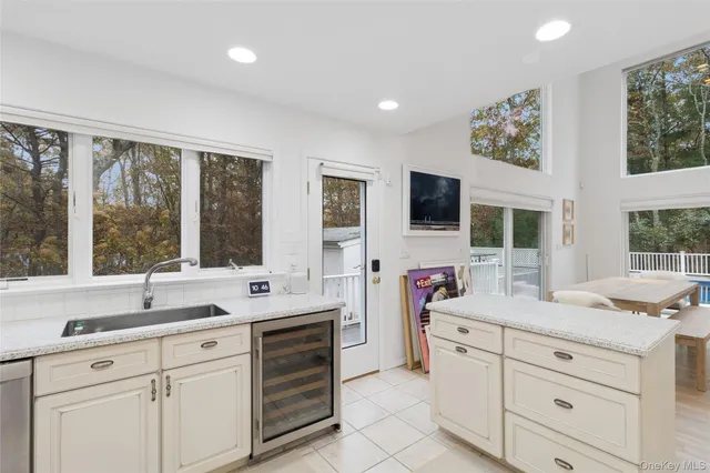 a bathroom with a sink double vanity and a window