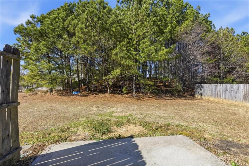 460 Parkway Road Union City, GA 30291 - Photo 18 of 18 a view of a yard with large trees
