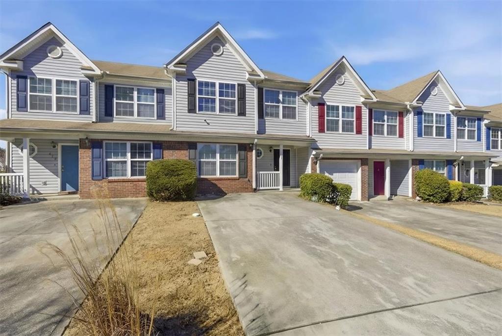 460 Parkway Road Union City, GA 30291 - Photo 3 of 18 a front view of multiple houses