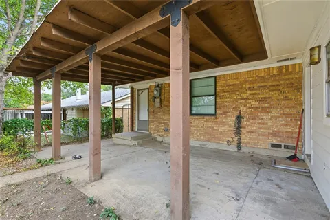 a view of a porch of a house