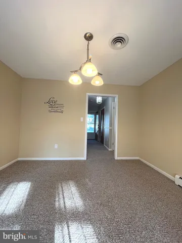 a view of a livingroom with a chandelier