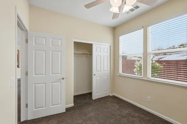 a bathroom with a shower and a toilet