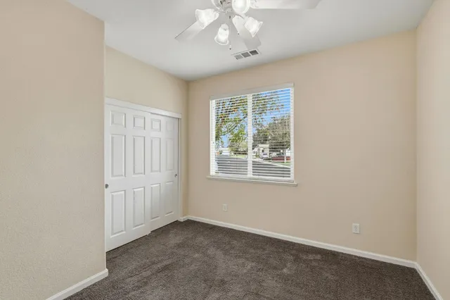 a view of a back yard of the house