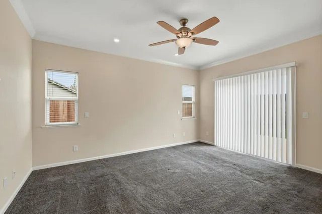 a view of a house with backyard