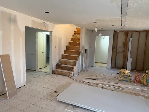 a view of a hallway with closet and entryway
