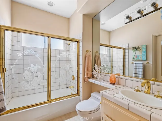 a kitchen with counter top space cabinets and stainless steel appliances