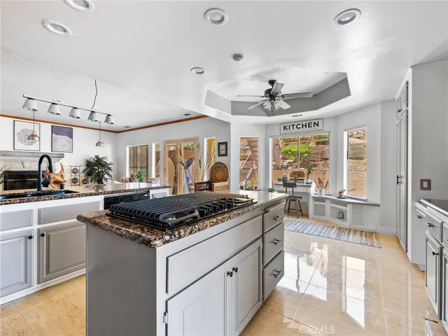 a bedroom with furniture and a flat screen tv