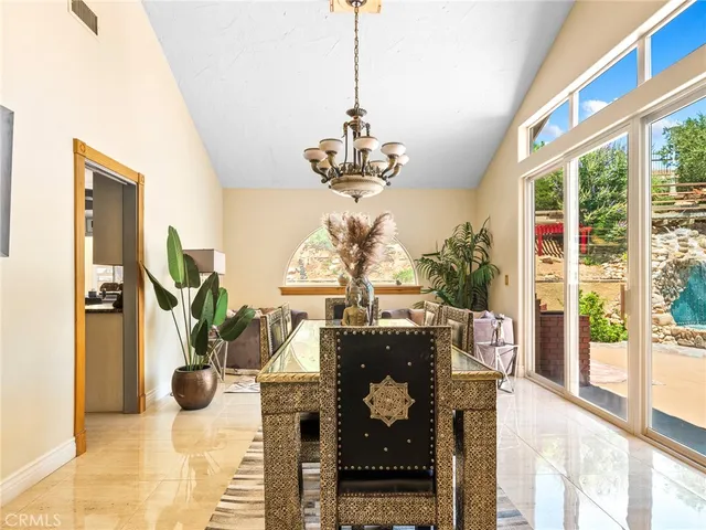 a bathroom with a double vanity sink mirror and shower