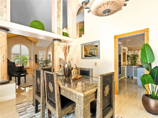 a spacious bathroom with a granite countertop tub and a large window