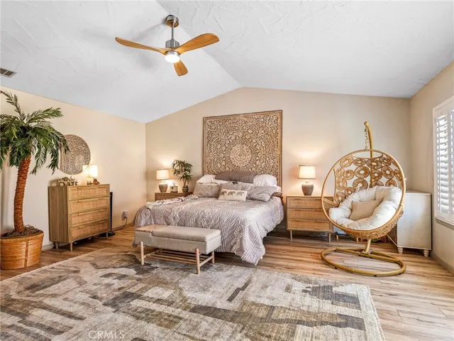 a bathroom with a double vanity sink a mirror and a shower