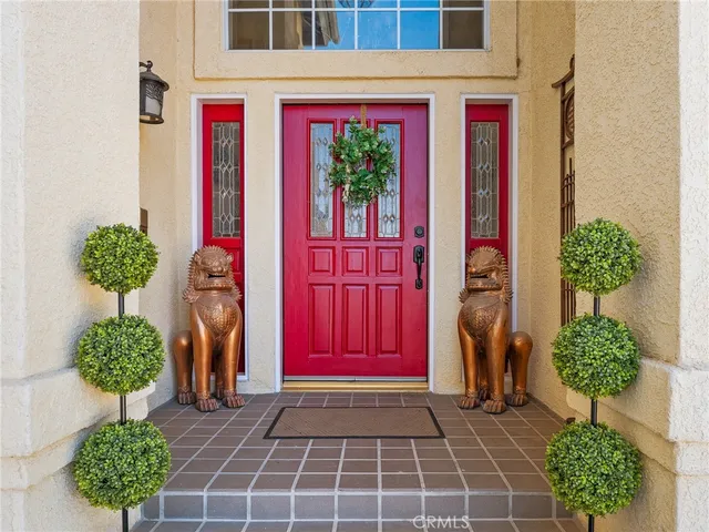 a view of a entryway with flower pots