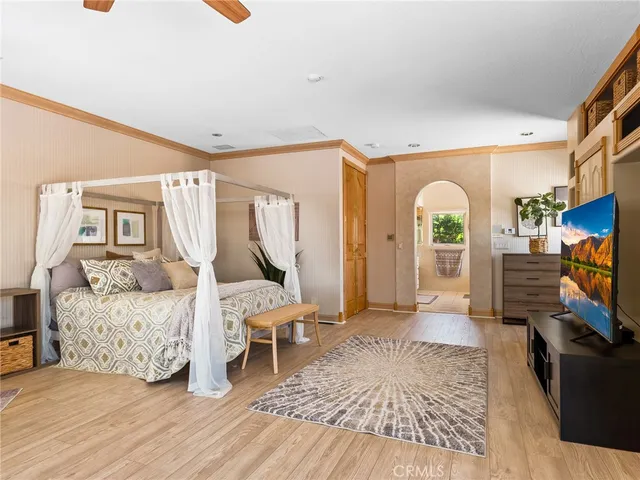 an aerial view of a house with a swimming pool