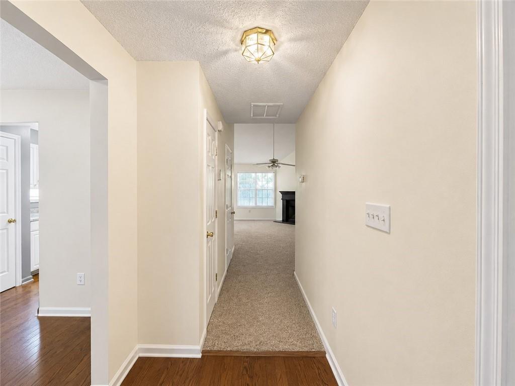 6936 Red Bone Way Stonecrest, GA 30038 - Photo 2 of 17 a view of empty room with a fireplace