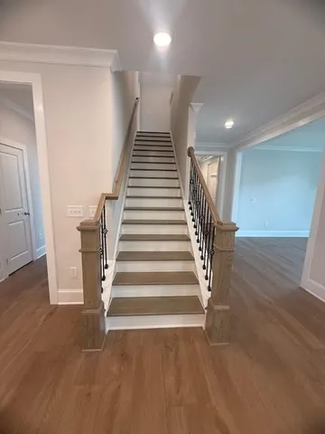 a view of entryway with wooden floor