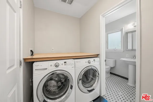 a bathroom with a sink a bathtub and a shower