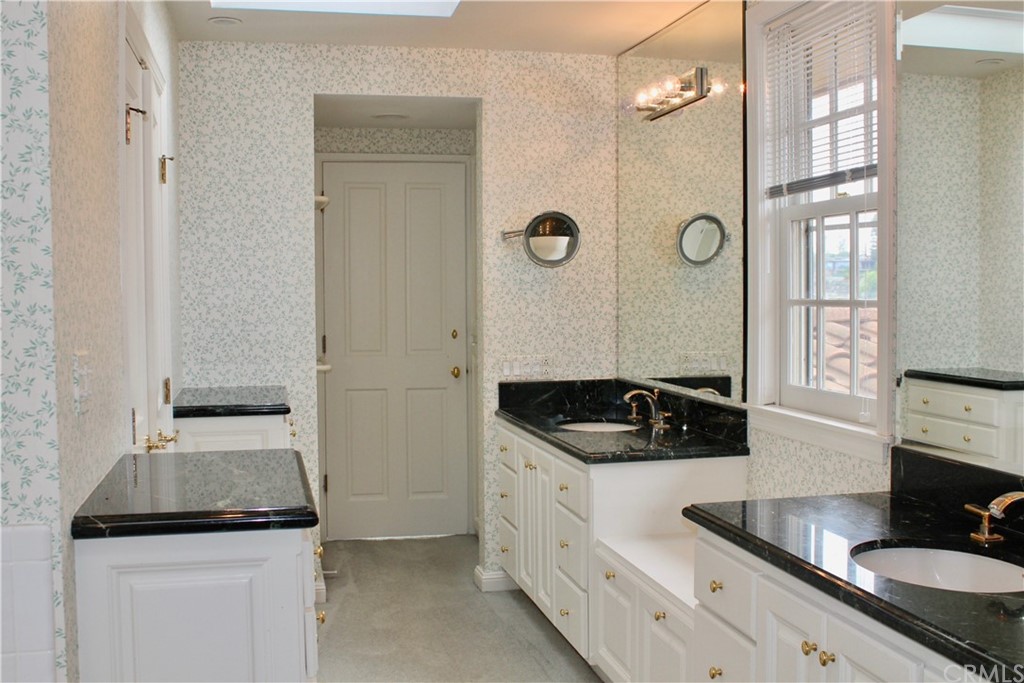 6832 Verde Ridge Road Rancho Palos Verdes, CA 90275 - Photo 18 of 26 a kitchen with granite countertop a sink and a stove