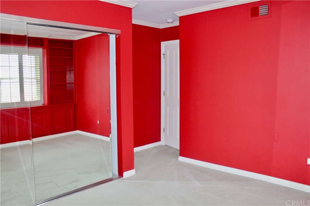6832 Verde Ridge Road Rancho Palos Verdes, CA 90275 - Photo 25 of 26 a view of a room with red walls and a window
