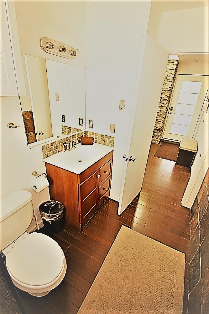 129 West San Juan Avenue, Unit R11 Telluride, CO 81435 - Photo 11 of 18 a bathroom with a sink mirror and toilet