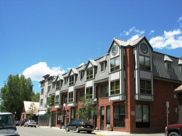 129 West San Juan Avenue, Unit R11 Telluride, CO 81435 - Photo 18 of 18 a front view of a building with street view