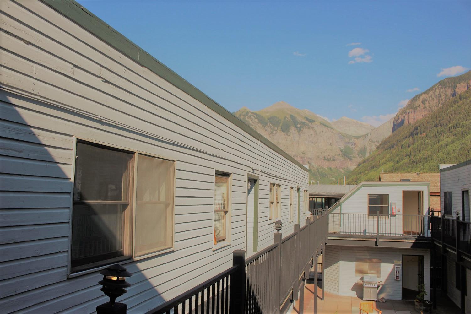 129 West San Juan Avenue, Unit R11 Telluride, CO 81435 - Photo 4 of 18 a view of a house with a roof deck