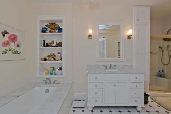 a bathroom with a sink a toilet and a bathtub