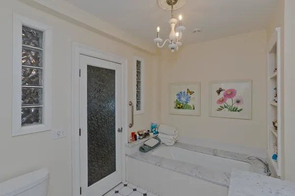 a view of a hallway with workspace