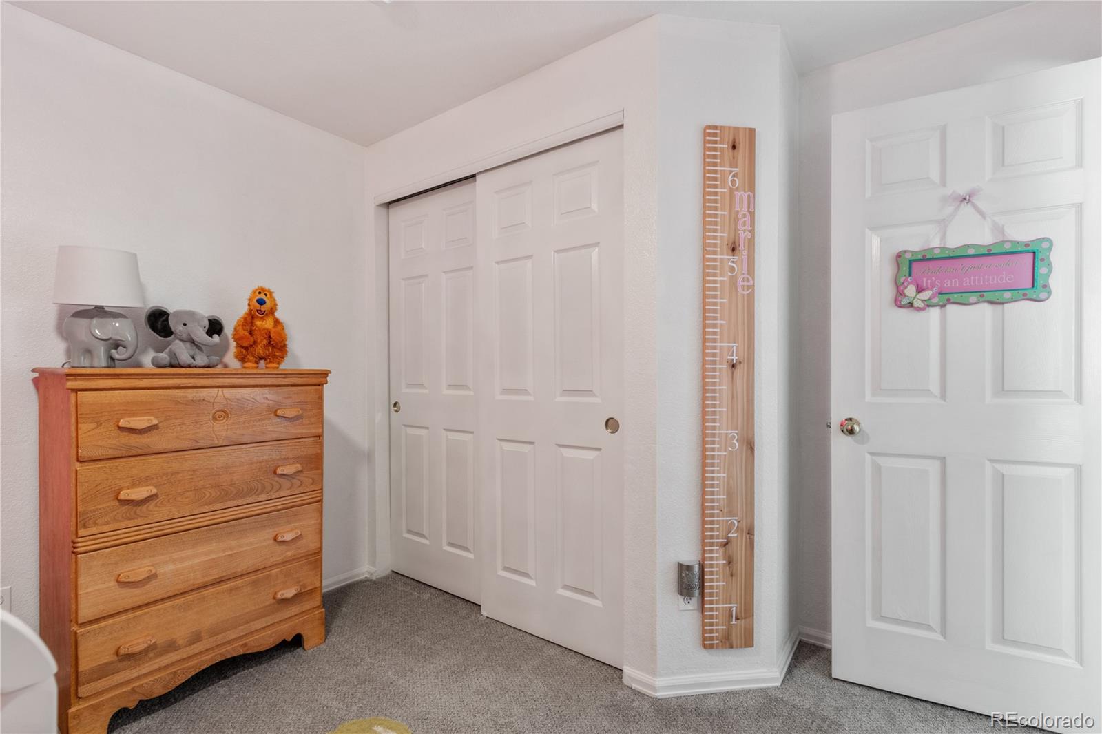 5405 Wolf Street Frederick, CO 80504 - Photo 22 of 36 a view of room with cabinet and stairs