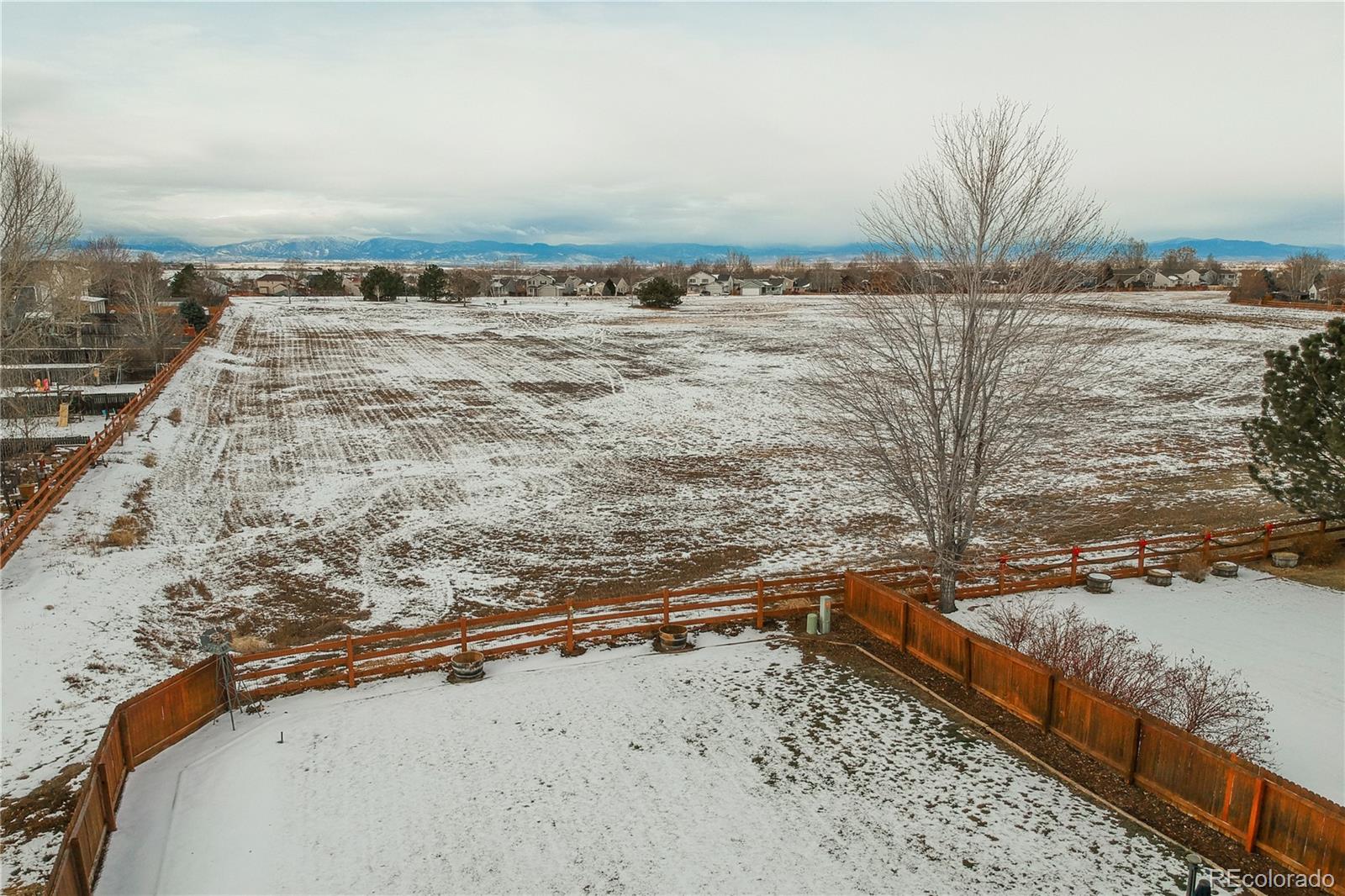 5405 Wolf Street Frederick, CO 80504 - Photo 31 of 36 a view of a terrace with a lake