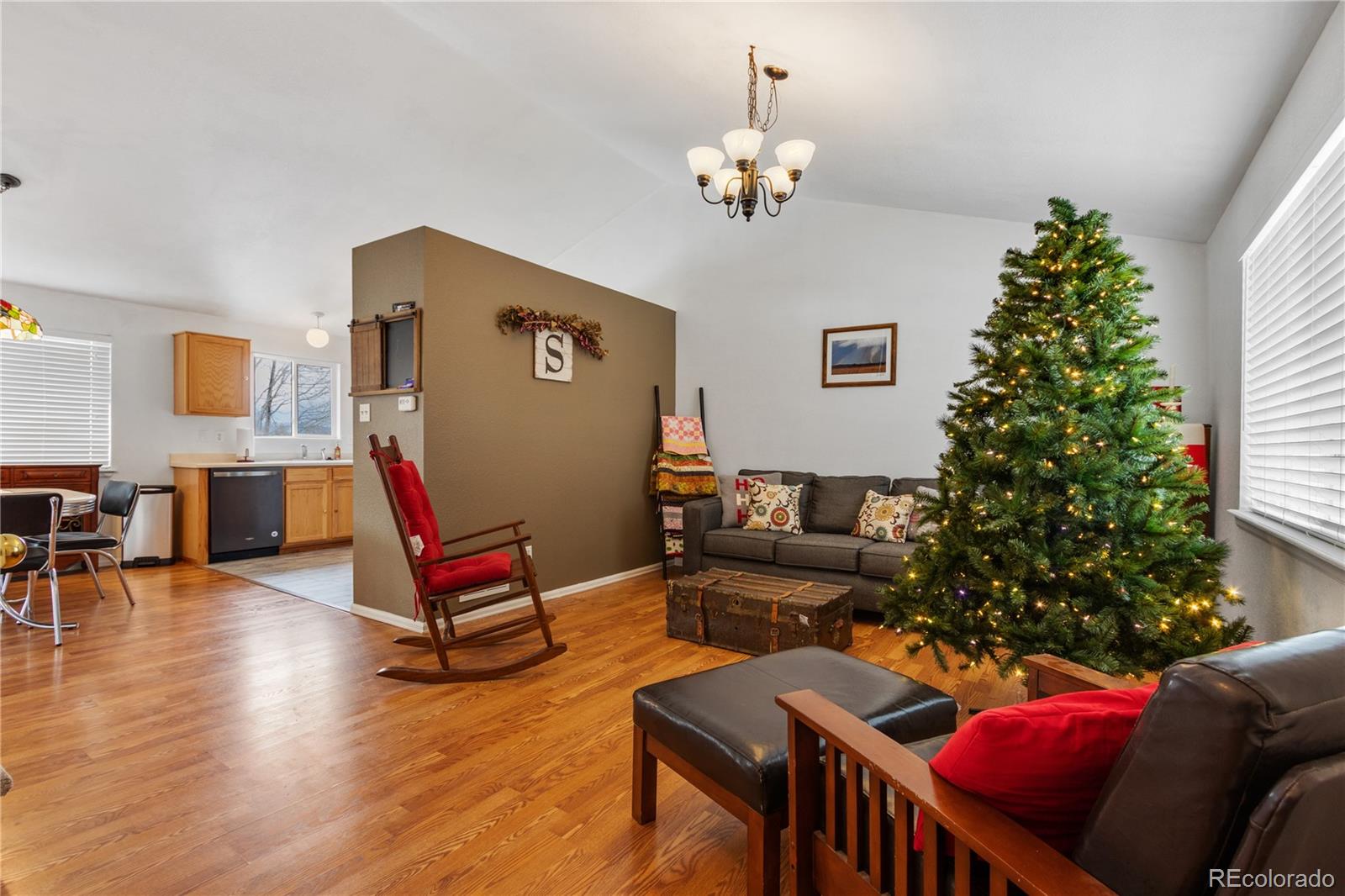 5405 Wolf Street Frederick, CO 80504 - Photo 5 of 36 a living room with furniture and wooden floor