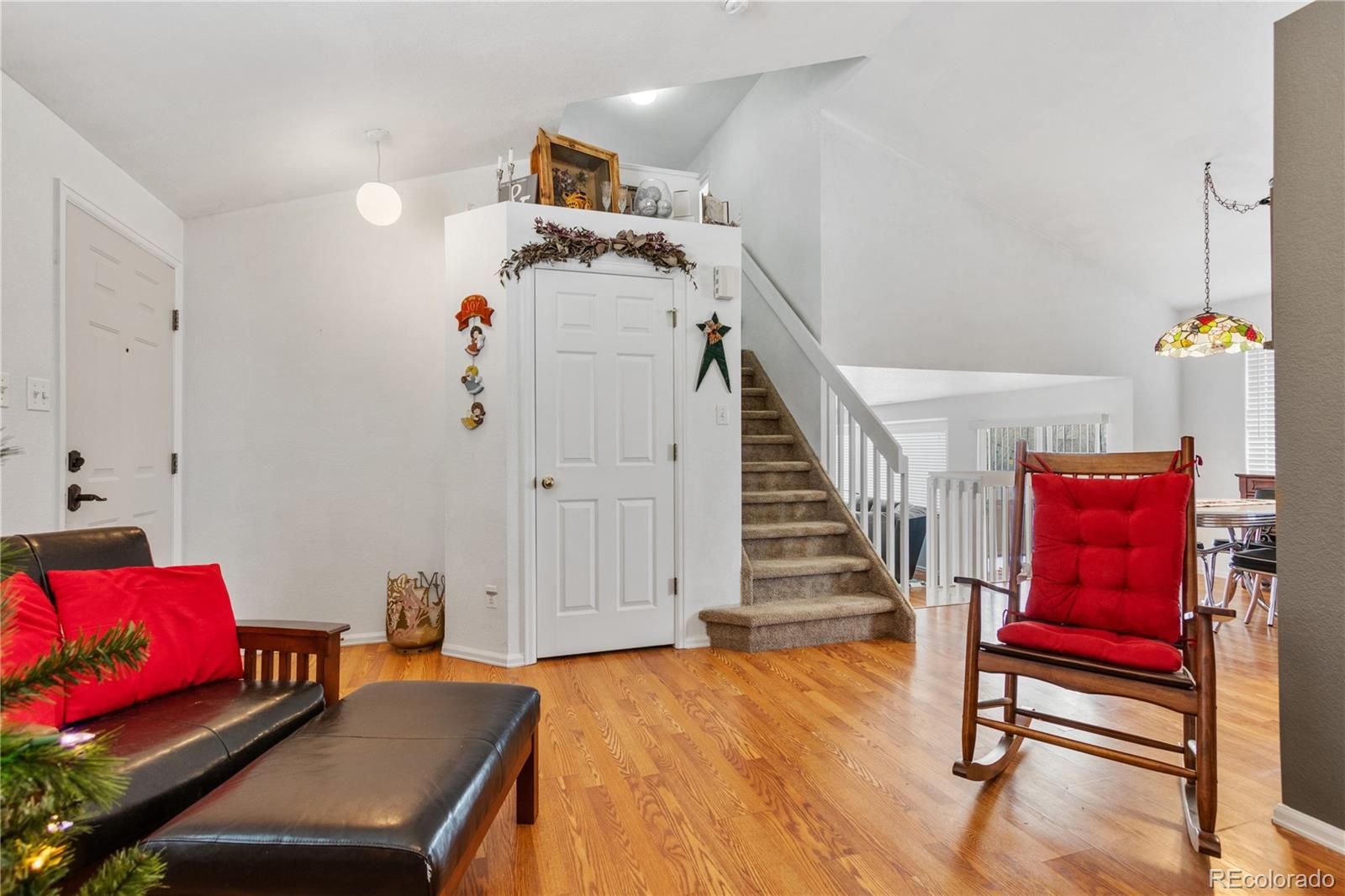 5405 Wolf Street Frederick, CO 80504 - Photo 8 of 36 a view of a livingroom with furniture and a workspace