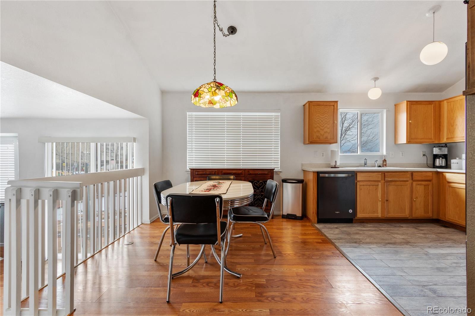 5405 Wolf Street Frederick, CO 80504 - Photo 9 of 36 a view of a kitchen and dining room