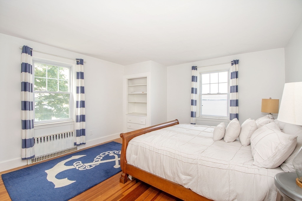 90 Shore Avenue Quincy, MA 02169 - Photo 30 of 38 a bedroom with a bed and a window