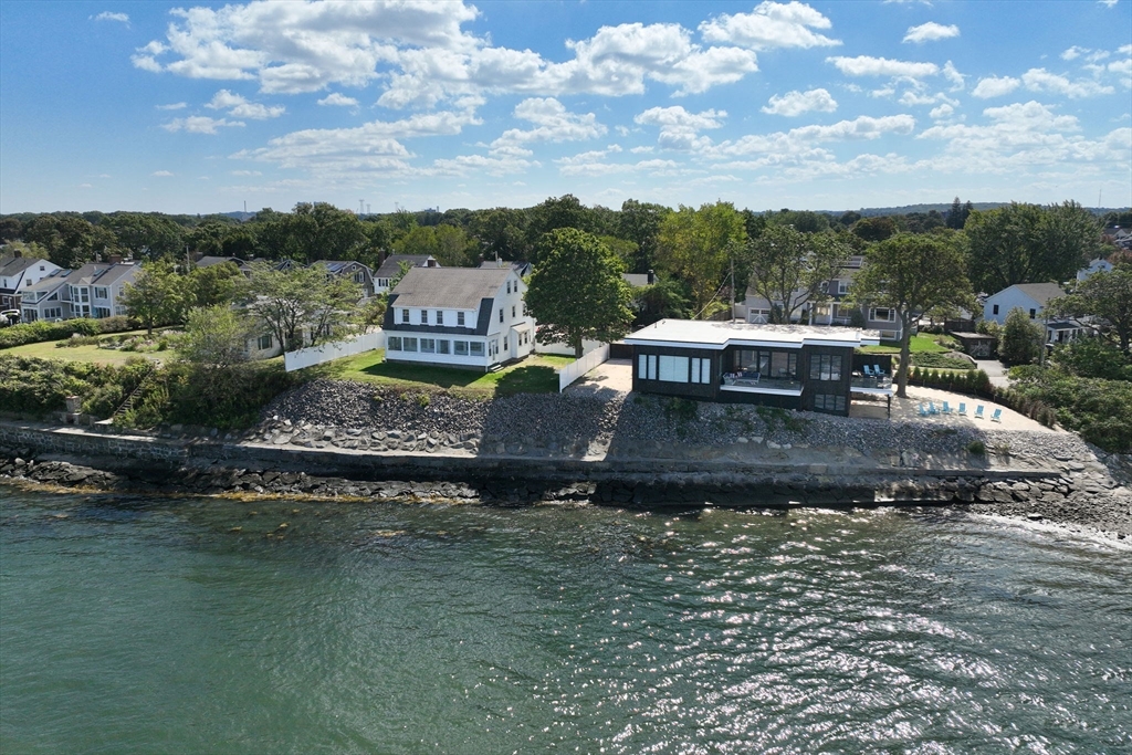 90 Shore Avenue Quincy, MA 02169 - Photo 7 of 38 a view of a table and chairs in the garden