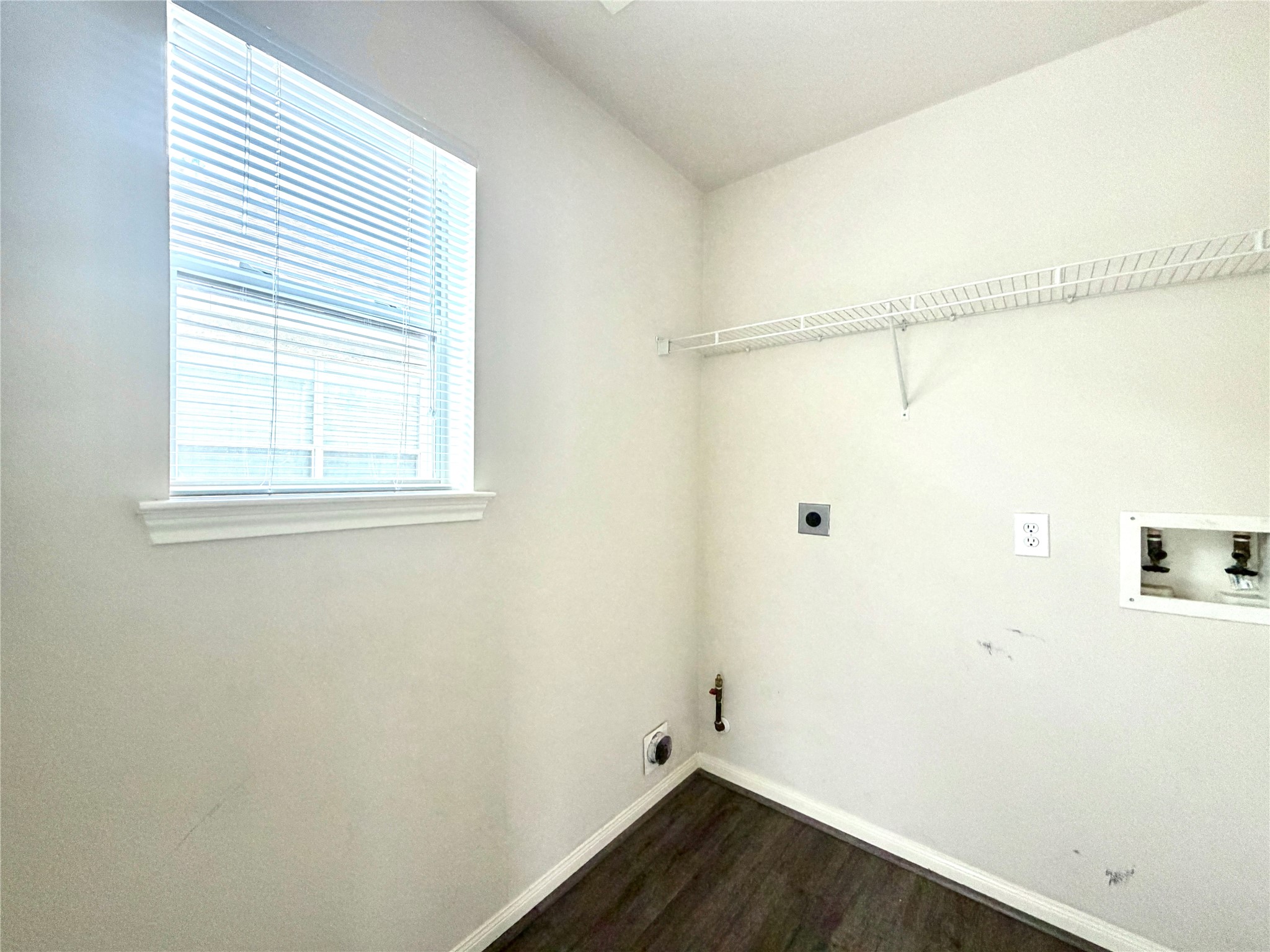 25203 Bluma Ranch Drive Katy, TX 77494 - Photo 12 of 26 a view of a small space with wooden floor and a window