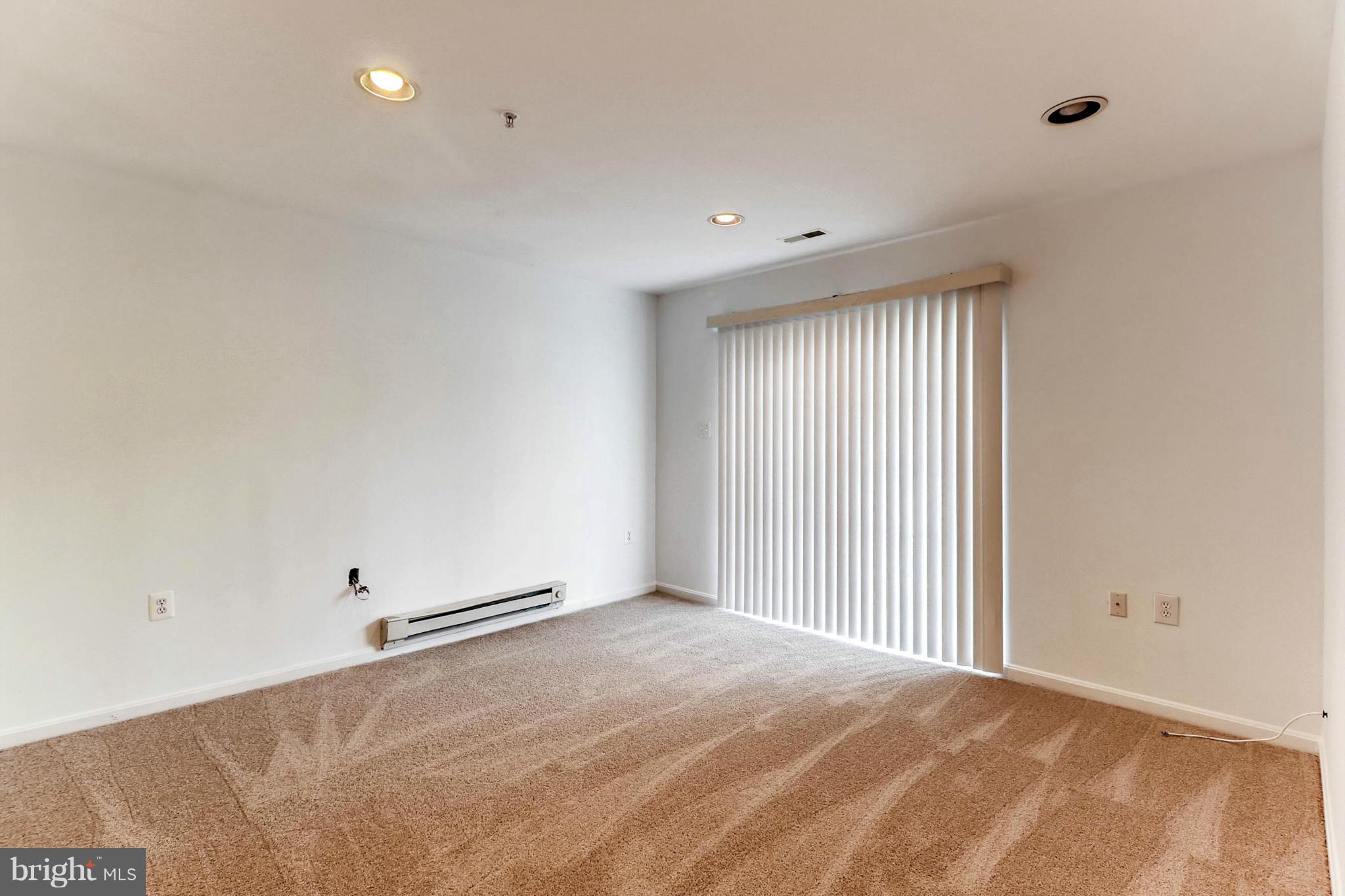 4631 Ashforth Way Owings Mills, MD 21117 - Photo 24 of 30 Lower Level Family Room