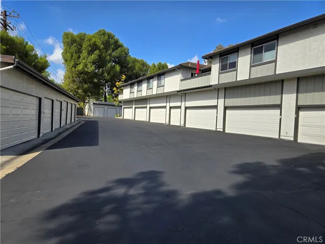 a view of a house with a street