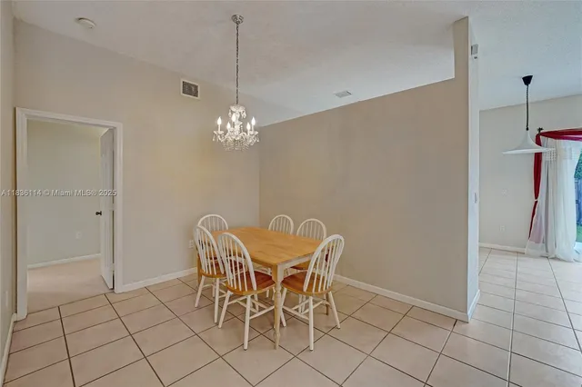 a dining room well furnished