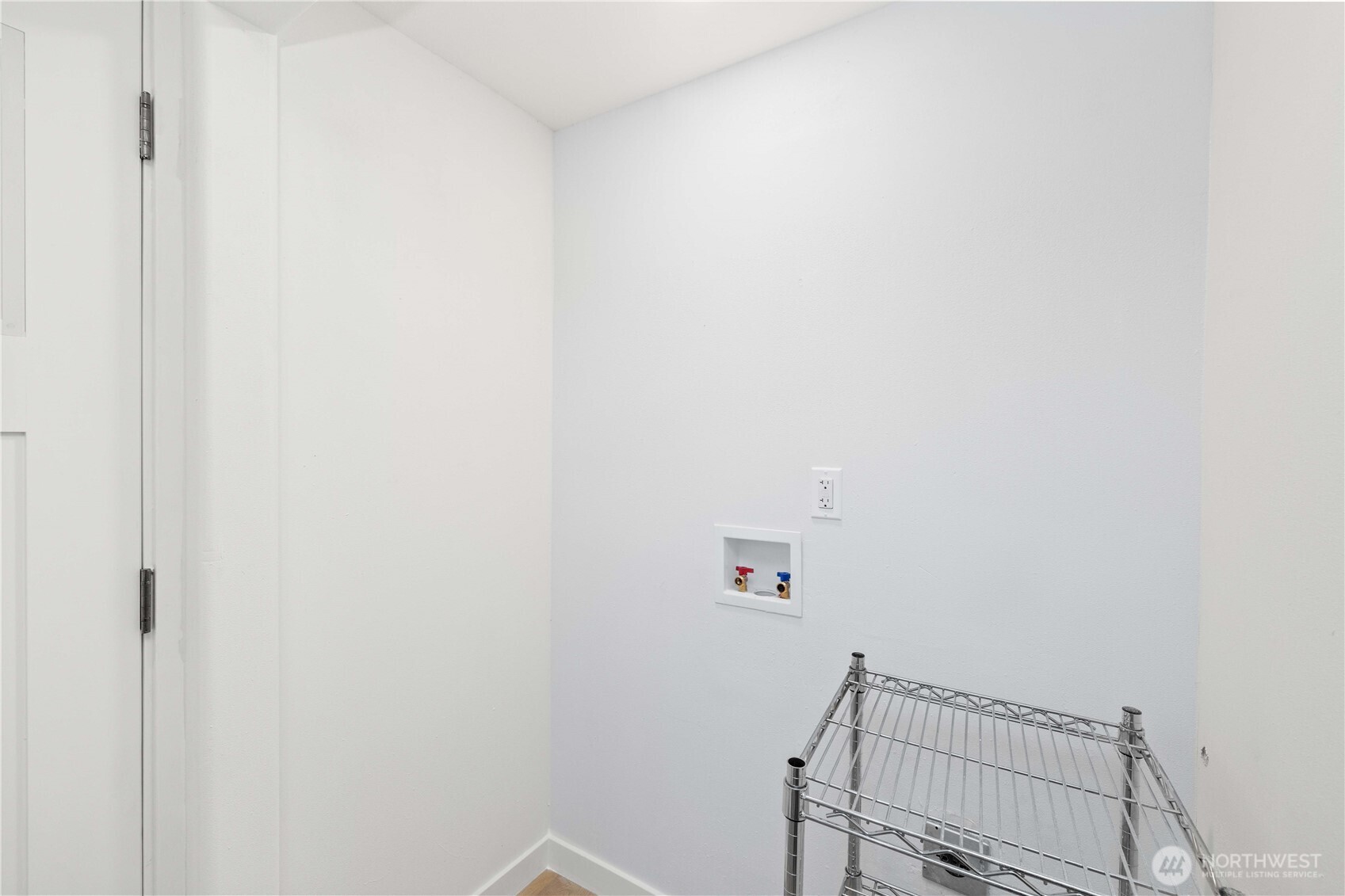 27428 Witte Road Southeast Maple Valley, WA 98038 - Photo 21 of 31 a view of a room with racks on the wall